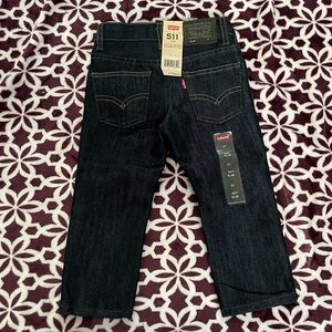 Levi’s, toddler size 2T. Dark denim color